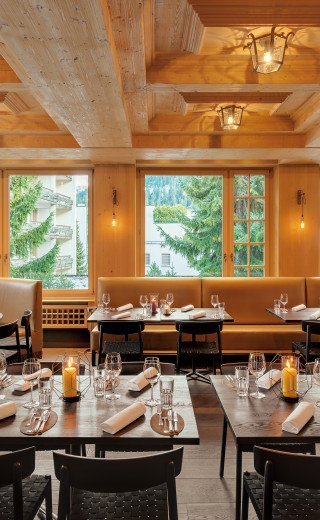 Pöstli Grill Prepared dinner tables at the "Pöstli Grill" restaurant in Davos