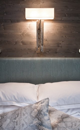Double bed of the Design Standard room in Davos