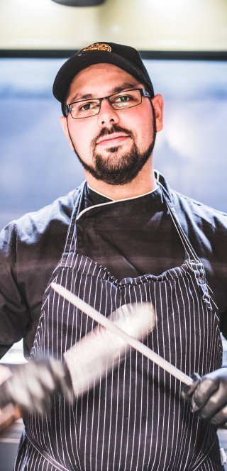 Der Koch im Pöstli Grill in Davos