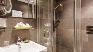 Bathroom of the "Posthotel" Single Sport Room in Davos