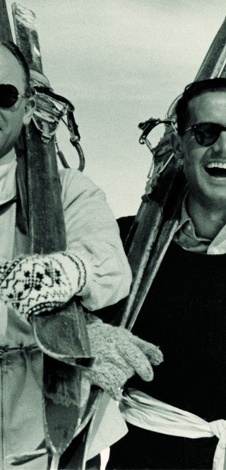 Historic picture of two skiers