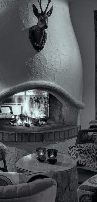 Lobby with open fireplace in the Morosani Hotels Davos