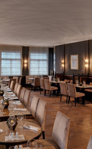 Damoro Eingedeckte Tische im Restaurant "Damoro" des Morosani Hotels