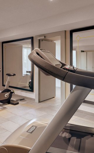 Fitness room in Schweizerhof Hotel