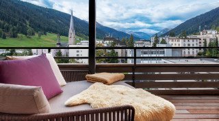 Room balcony with mountain view of the "Schweizerhof" Suite