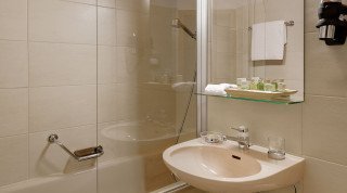 Bathroom at the Morosani "Schweizerhof" Villa Double Standard room 